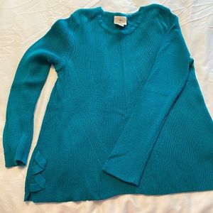 Teal colored sweater